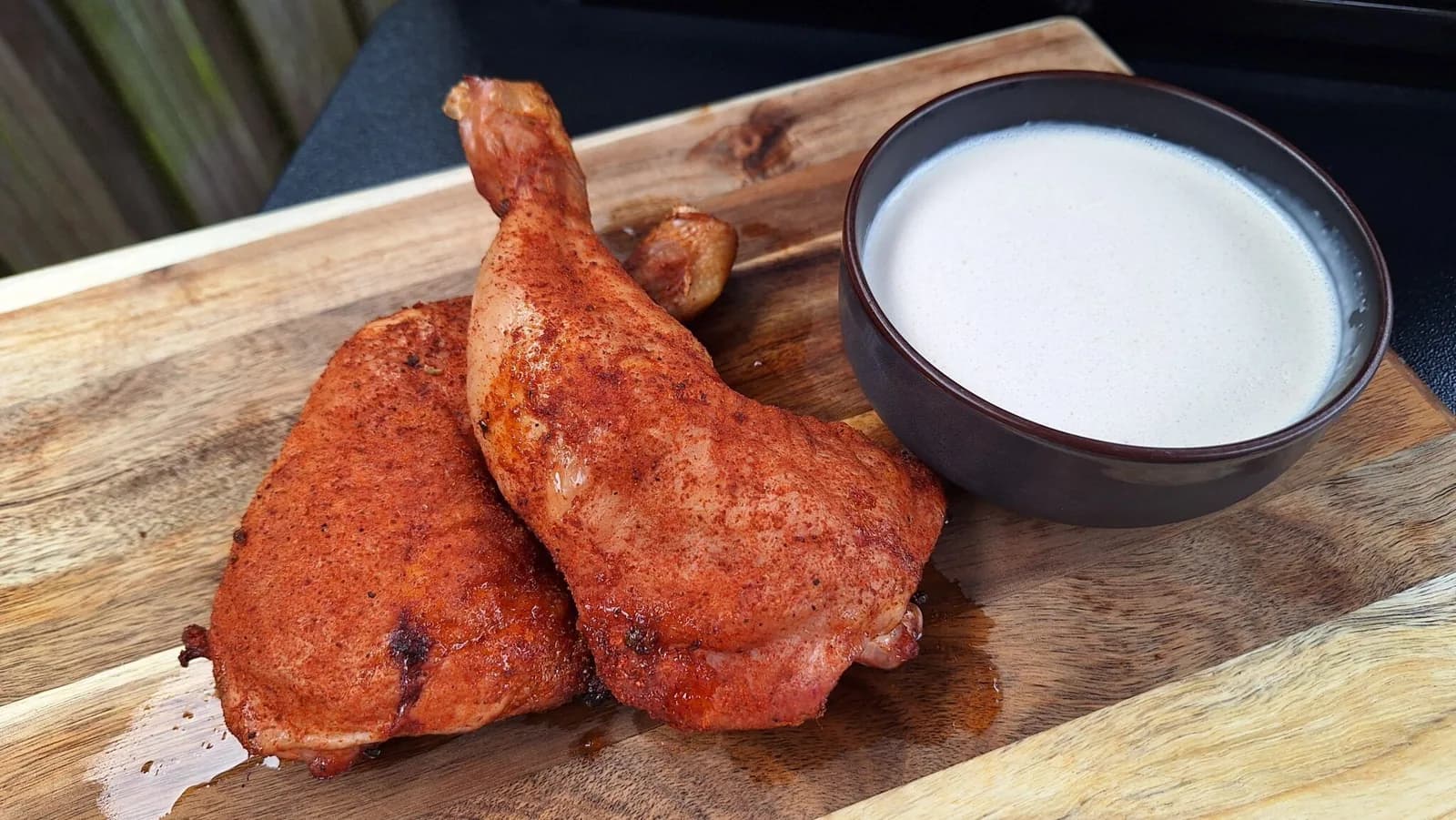 Smoked chicken legs with Alabama white sauce